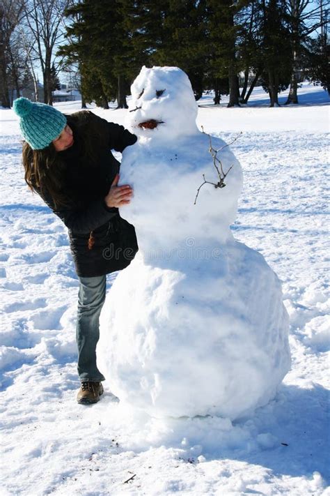 Building a snowman stock photo. Image of together, outside - 1777324