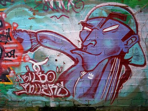 Bright graffiti with a baseball player in bilbao free image download