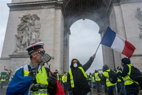 Photos Of The Paris Protests Show How Destructive The City's Worst Riot In A Decade Became