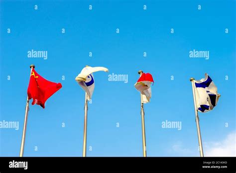 national flags flying in wind Stock Photo - Alamy