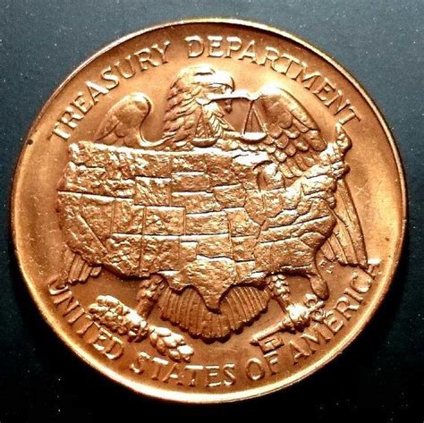 an image of a gold coin with the united states on it's reverse side