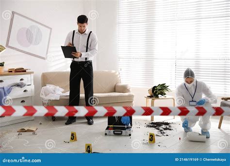 Investigators Working at Crime Scene in Living Room Stock Image - Image ...