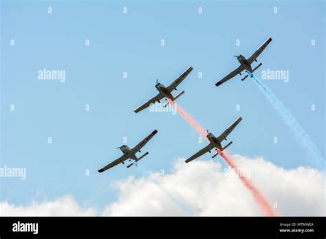 Airplanes doing stunts at an airshow Stock Photo - Alamy