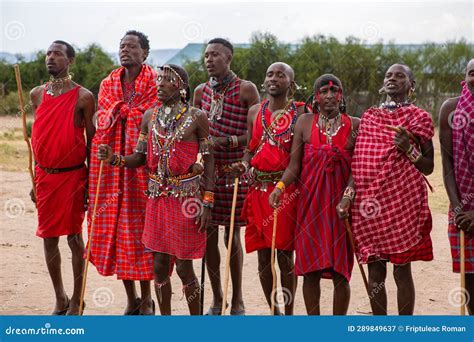 Masai in Traditional Colorful Clothing Showing Maasai Jumping Dance at ...