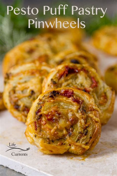 Pesto Puff Pastry Pinwheels are super easy to make pinwheel appetizers with basil pesto, roast ...