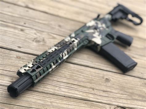 M81 Woodland Camo Cerakote, 10.5″ bbl AR Pistol, 5.56 Nato – Bad Moon Armory