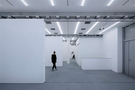 CASE-REAL installs movable walls inside a basement art gallery in tokyo