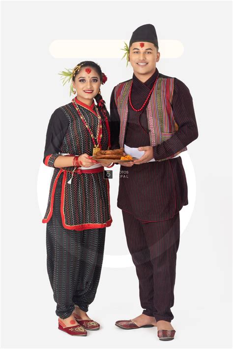 young couple in newari dress celebrating dashain festival - Photos Nepal