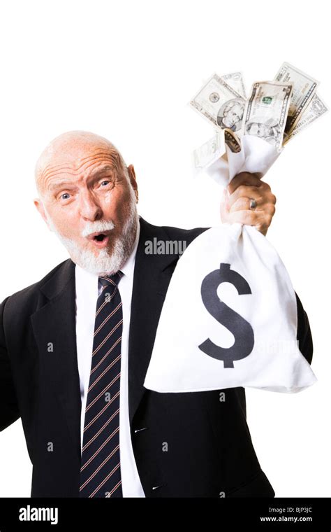 Portrait of businessman holding money bag Stock Photo - Alamy