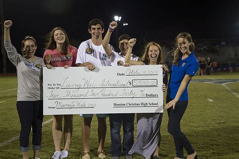 Students at Houston Christian High School challenged fellow classmates to trade their homecoming ...