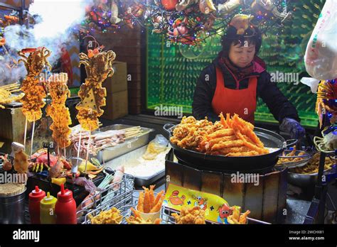 Myeongdong Night Market in Seoul, South Korea Stock Photo - Alamy