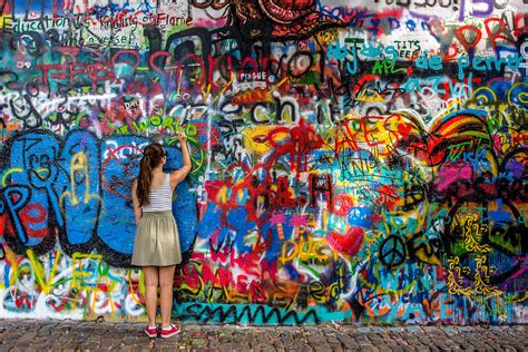 John Lennon Graffiti Wall in Prague Photograph by Kelly Michailidis - Fine Art America