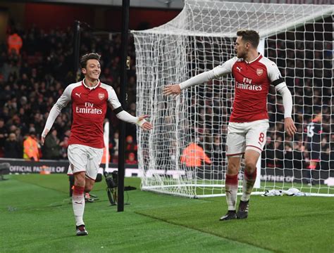 LONDON, ENGLAND - NOVEMBER 29: (L-R) Mesut Ozil and Aaron Ramsey ...