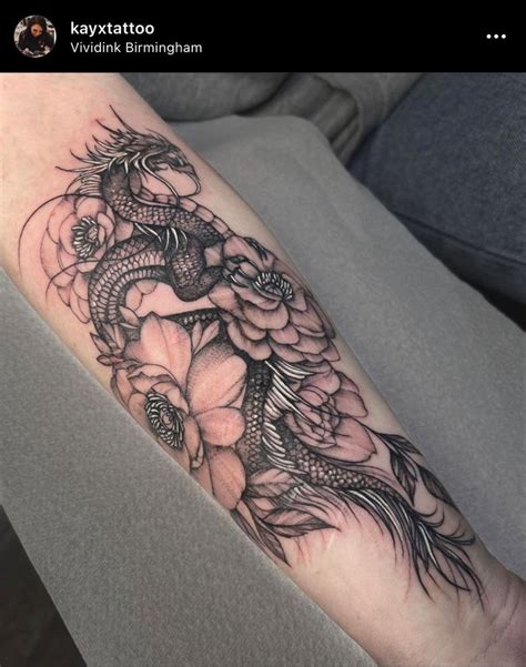 Dragon tattoo with flowers | Tattoos, Dragon tattoo, Dragon tattoo with ...