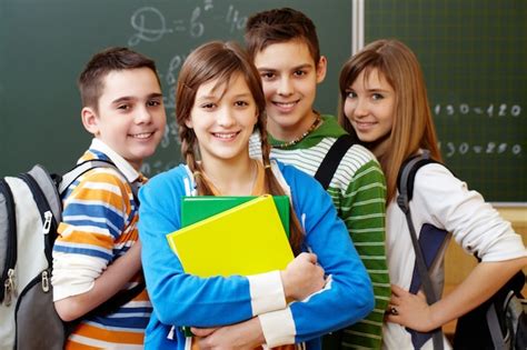 Free Photo | Smiling students with backpacks