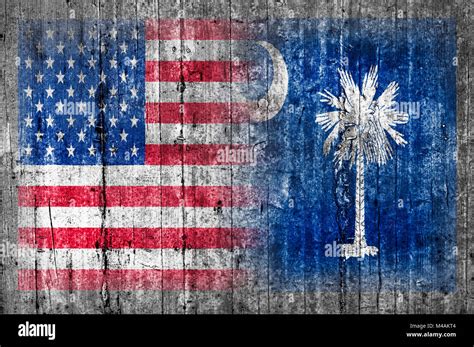 USA and South Carolina flag on concrete wall Stock Photo - Alamy