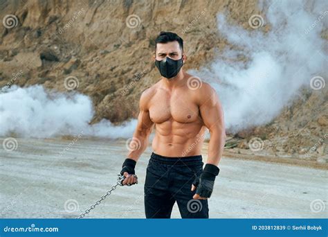 Handsome Man with Athletic Body Posing Outdoors Stock Image - Image of training, exercise: 203812839