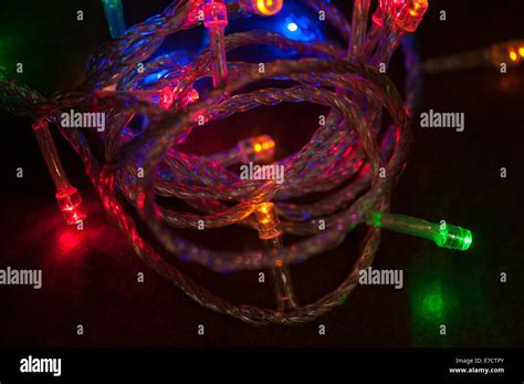 Christmas lights on dark background Stock Photo - Alamy