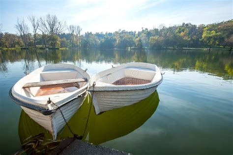 Two boats on the lake stock photo. Image of romantic - 109945702