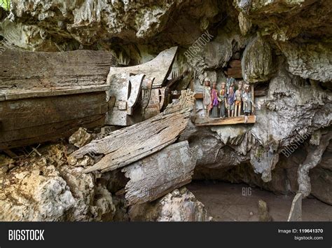 Wooden Statues Tau Tau Image & Photo (Free Trial) | Bigstock