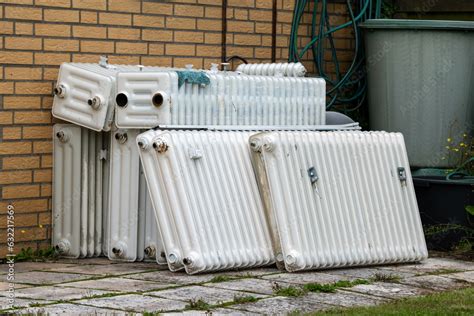 Old radiators after removal during a renovation Stock Photo | Adobe Stock