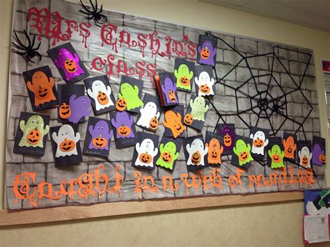 Halloween bulletin board. "Caught in a web of reading". | Halloween ...