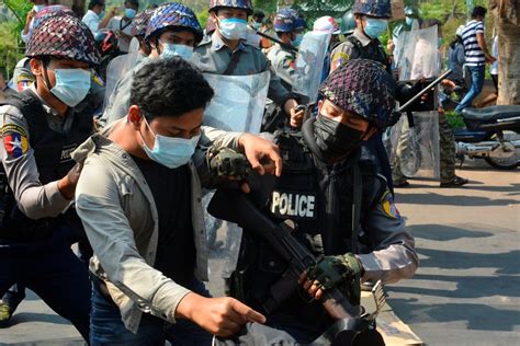 Myanmar police fire rubber bullets, wounding three, as hundreds of ...