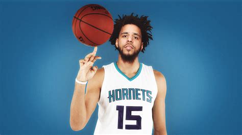 J Cole With Basketball Is Wearing White Sports Dress In Blue Background HD J Cole Wallpapers ...