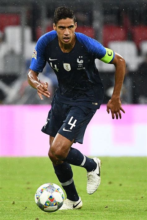 France's defender Raphael Varane runs with the ball during the UEFA... | Raphael varane, Soccer ...