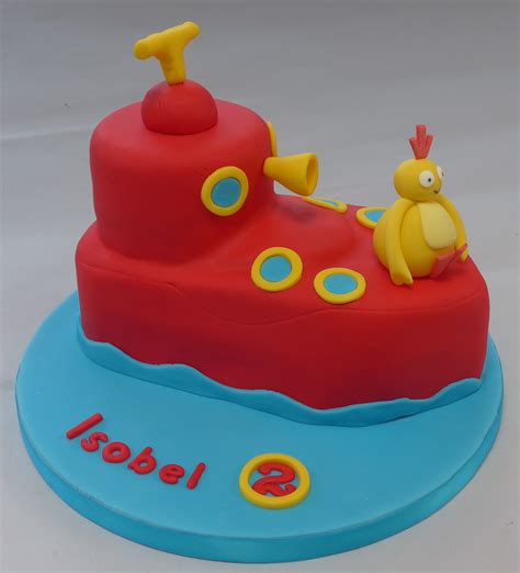 Twirlywoo boat cake - shaped vanilla sponge covered in red fondant and ...