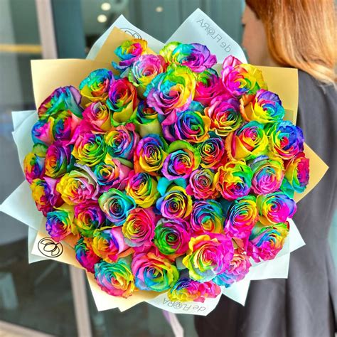 Rainbow roses bouquet by deFLORA LLC Flower Shop