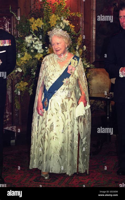 The Queen Mother, wearing a tiara, attending the opening ceremony of ...