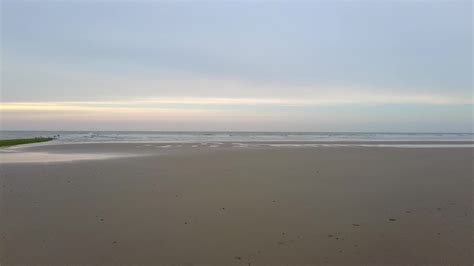 Movie over the beach of the Belgian coastal town of Middelkerke ...