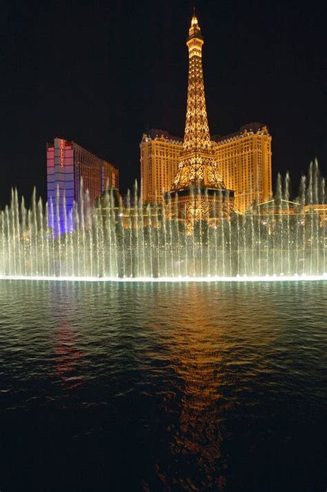 Bellagio Casino Water Show at Night with Paris Casino and Eiffel Tower, Las Vegas, NV Editorial ...