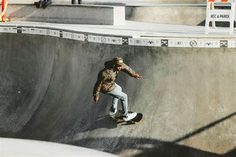 Person Performing Skateboard Tricks · Free Stock Photo