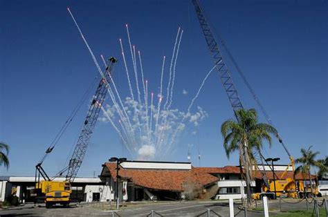 Bragg Crane Service demolishes showroom of Auto Dealer (Awesome Video ...