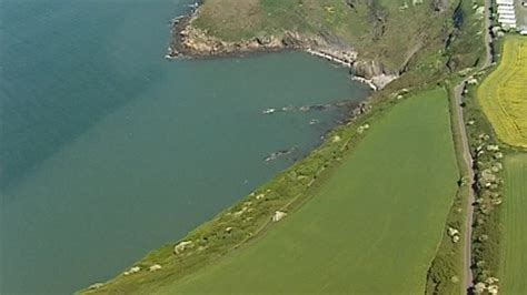 Call for better Wales Coastal Path promotion to tourists - BBC News