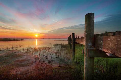 Sunrise Over the Lake Photograph by Debra and Dave Vanderlaan - Fine ...