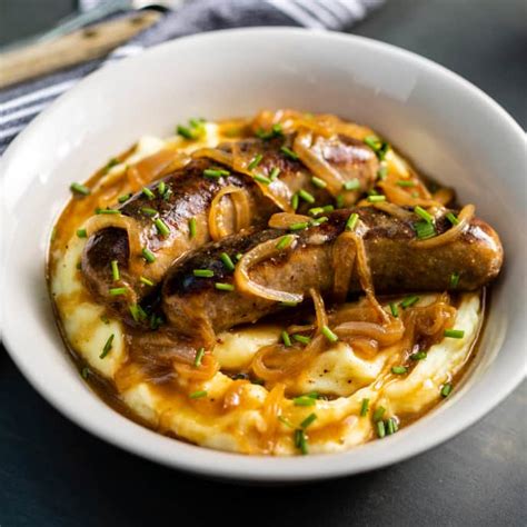 Bangers and Mash with Guinness-Onion Gravy | Cook's Country Recipe