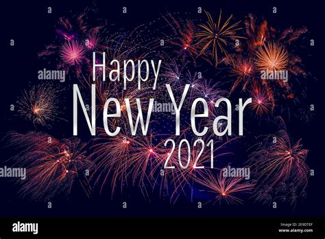 Happy New Year 2021 greeting with colorful fireworks in the night sky ...