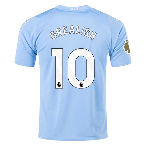 Kid's Replica Puma Grealish Manchester City Home Jersey 23/24 770441-01 ...