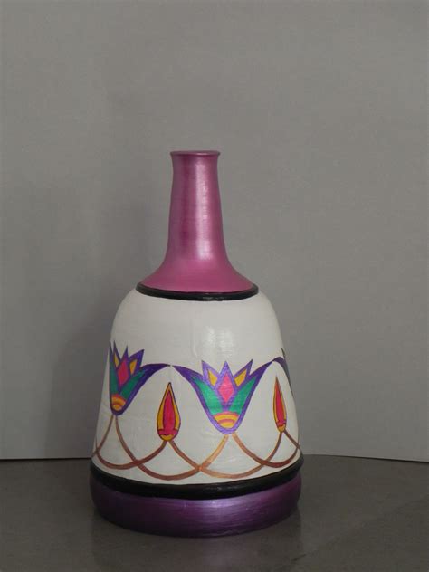 Egyptian Style Pot Floral design in Egyptian style. White background, pink neck & violet bo ...