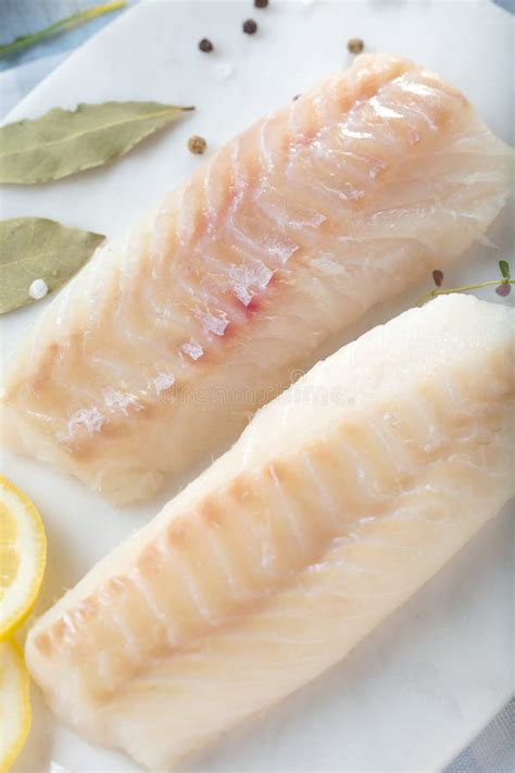 Fresh Fish, Raw Cod Fillets with Addition of Herbs and Lemon. Stock Image - Image of basil ...