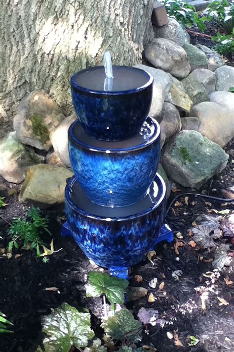 18 Outdoor Fountain Ideas - How To Make a Garden Fountain for Your Backyard