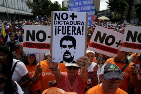 Denounced as dictator, Maduro backs down, reverses court’s ruling on ...