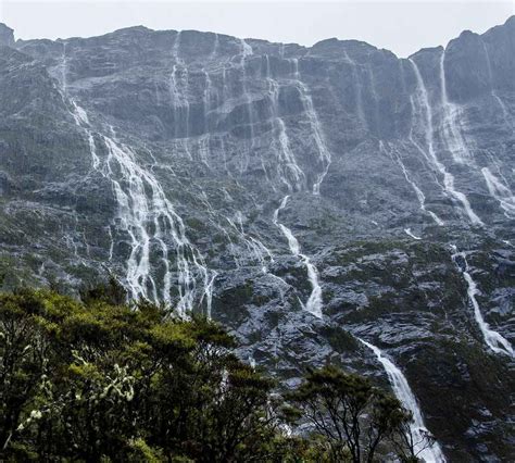 Milford Sound, New Zealand. Heavy rain makes it the most magical place ...