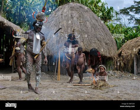 Papuan people in the village Wamena Papua Indonesia Stock Photo - Alamy