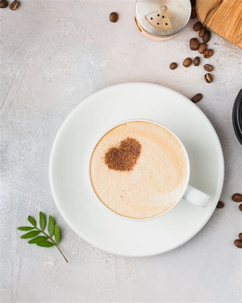 Round White Ceramic Saucer And Coffee Cup · Free Stock Photo