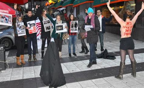 Strip and strike: Iranian activists go topless to protest against hijab