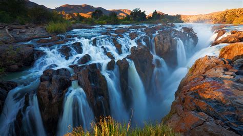 Epupa Falls on the Cunene River, Kaokoland in Kunene Region, border of Angola and Namibia ...